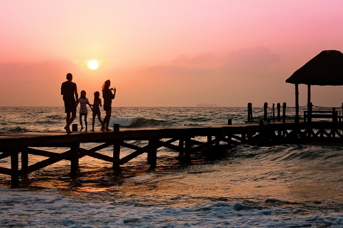 Family Walking on Pier